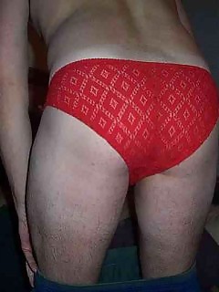 Slutty red panties cover this horny pantie boys cute ass